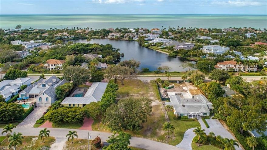 L.2193 - Beautiful, oversized single family vacant lot just 3 blocks to the beach! Plenty of options here in this charming, Olde Naples neighborhood. Previous residence was razed so you have a clean slate to start designing your magnificent new home facing Third Street with a view of the Lake directly across the street or fronting on the quiet Palm Circle West in the lovely Ridge Lakes neighborhood of Olde Naples. Over 17,000 sq ft lot for your family home or winter retreat, just two minutes from world-class shopping and dining on Fifth Avenue or Third Street South...and of course, our incredible sunsets!
