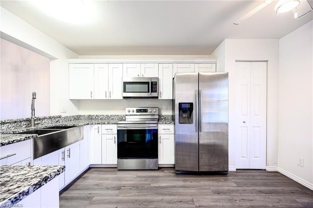 Photo of 1476 Churchill CIR #J-202, NAPLES, FL 34116 (MLS # 226010887)