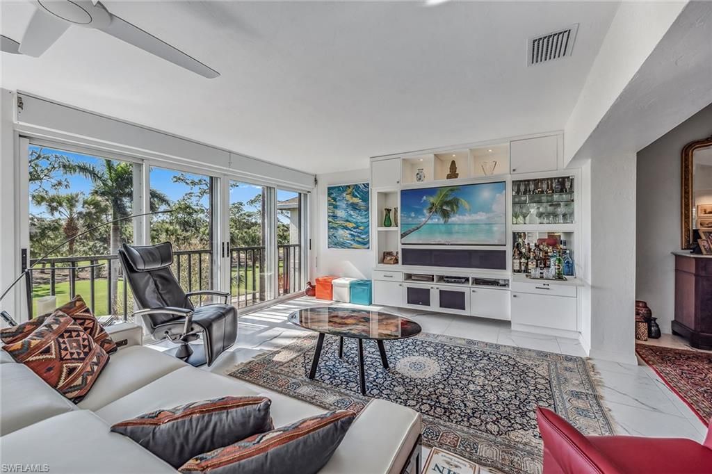 Photo of 764 Eagle Creek DR #301, NAPLES, FL 34113 (MLS # 226013819)