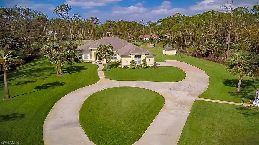 Magnificent home built by contractor for his own use on 2.7 acres of land.  Many upgrades throughout.  Open concept with coffer ceilings, sound system throughout the home, lanai and gazebo, perfect for entertaining. Well designed for multiple use of the den and office, perfect for an art studio or sewing area.  Attached 2 car oversized garage (27 X 25) and detached building used as a workshop with 14 ft rolled door.  Plenty of room for an RV, boat or additional garage space. New water system installed in 2017.  Front yard irrigated with 12 zones, newer kitchen appliances.  A must see!