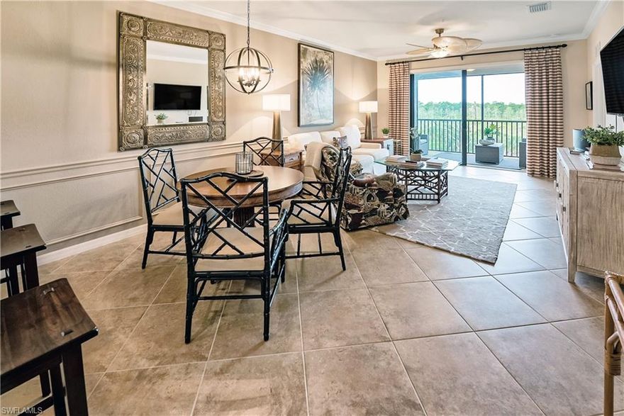 RARE TOP FLOOR  TURNKEY unit WITH  TPC GOLF MEMBERSHIP, and PROVEN RENTAL INCOME NOW AVAILABLE in Giaveno at Treviso Bay! Offered fully furnished, this Antonia-model condo is decorated with everything you need. The eat-in kitchen offers all stainless-steel appliances, granite counters, a pantry, a breakfast bar, and a breakfast nook. Additional features of this sought-after 4th-floor unit include 2 bedrooms, 2 full baths, a storage room, and conveniently assigned covered parking. At the amenity-rich Treviso Bay, residents can enjoy championship golf, biking/jogging trails, resort club, pool, spa, tennis, restaurants, a cutting-edge fitness center, and the list goes on. Treviso Bay is ideally located less than 5 miles from Olde Naples, 5th Ave, the Pier, velvet-sand beaches, and the Gulf of Mexico. Perfect vacation getaway or forever home. Your island oasis awaits!