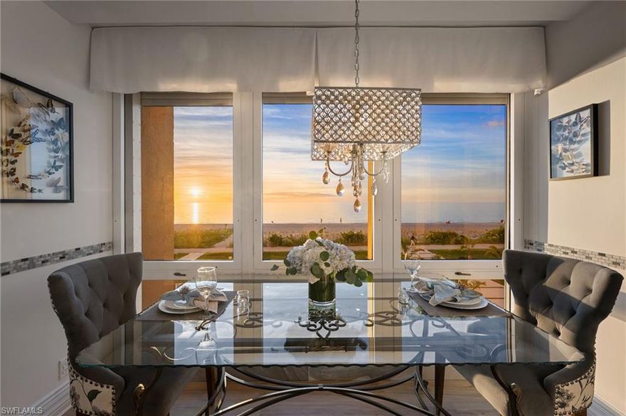 Ideally located directly on the beach in Naples, this exceptional condominium offers an effortless coastal lifestyle defined by refined living, timeless sophistication, and immediate access to sun, sand, and Gulf breezes. Encompassing 2,565 square feet of thoughtfully designed living space, this three-bedroom, three-bath residence is ideally suited as a second or third home and is offered furnished for immediate enjoyment.
The interior has been tastefully refreshed to reflect a light, relaxed elegance. Wide-plank LVT flooring flows throughout the main living areas, while sliding glass doors bathe the residence in natural light and open seamlessly to the lanai. The spacious kitchen features quartz countertops, abundant cabinetry, and a sleek electric range—well suited for both casual living and entertaining visiting family and friends.

The primary suite serves as a private retreat, offering custom dual walk-in closets, smart-home adjustable blinds, and a beautifully reimagined bath with dual vanities, generous storage, a large soaking tub, walk-in shower, and private water closet. Two guest suites provide comfort and privacy, one with smart-home adjustable blinds and a walk-in shower, and the other featuring sliding plantation shutters, a built-in wooden desk, and a shower/tub combination.

Additional highlights include hurricane shutters throughout the residence, an updated laundry room with new countertop and cabinetry, one assigned parking space, and a private storage locker. The southwest-facing lanai captures tranquil Gulf views over the pool and beach, enhanced by new outdoor furnishings and a ceiling fan—an inviting setting for morning coffee or evening sunsets.
The building has undergone extensive renovations, elevating both its interiors and resort-style amenities. Residents enjoy a refreshed lobby, common areas, social room, guest suites, beach chair storage, and mail room. Outdoor amenities include a beautifully updated pool area with lounge chairs, umbrellas, gas grills, and a fire pit. Above the garage, a fully amenitized recreation deck offers pickleball and tennis courts, a putting green, bocce ball, yoga station, shuffleboard, half-court basketball, additional grilling areas, and a full building generator—providing peace of mind and year-round enjoyment.

This is a rare opportunity to own a move-in-ready beachfront residence in one of Naples’ most desirable coastal settings—where luxury, convenience, and effortless living come together beautifully.
Boaters, please inquire about the separately available, seller-owned B13 boat slip at the newly refurbished Venetian Bay slips, located just north of Venetian Village. The slip measures 12'6" in width and accommodates vessels 35 feet or more in length, and is equipped with a new remote-controlled 16,000-lb dual-motor lift—an exceptional complement to this refined beachfront lifestyle.  Your winter this year could be so peaceful, enjoying these incredible views...welcome home!