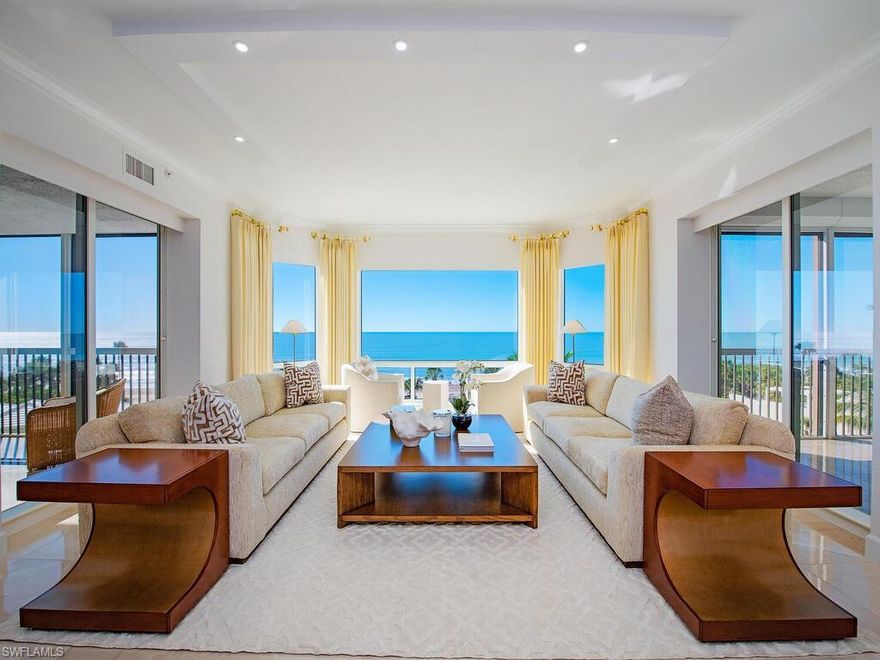 Experience elevated beachfront living in this elegant three-bedroom plus den, 3.5-bath residence at The Biltmore at Bay Colony, Naples’ premier gated, private Gulf-front community. Offering panoramic Gulf views from three lanais, this spacious, reimagined residence showcases timeless marble flooring, a fully remodeled gourmet kitchen with high-end appliances, exquisite master bedroom/bathroom, and elegant finishes throughout directed by the skilled Godfrey Design Consultants. The versatile den features a custom built-in, TV and fireplace accent wall, while all bedrooms enjoy en-suite baths for comfort and privacy. Additional highlights include two under-building garage spaces, a climate-controlled storage unit with electric, and resort-style amenities: pool and spa, fitness center, sauna, social lounges, guest suites, and a newly renovated lobby with 24-hour front desk. Residents enjoy exclusive access to the Bay Colony Beach Club with fine dining and full-service beach concierge, plus Pelican Bay’s beach clubs, tennis, pickleball, wellness centers, and tram service. Minutes from Mercato, Waterside Shops, Venetian Village, and 5th Avenue South, this residence delivers exceptional luxury, lifestyle, and value on the Gulf of America.