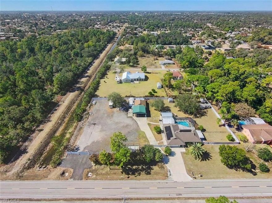 Welcome to this private 1.5-acre triple-lot POOL property offering space, versatility, and endless possibilities. This peaceful retreat is NOT located in a flood zone and features mature landscaping, an enormous extended paver patio with walkways, multiple detached storage sheds, a fenced area, extended driveway, and a screened and tiled pool area perfect for relaxing or entertaining.
Inside, the well-maintained home showcases tile flooring throughout, solid surface countertops, walk-in closets, and a recreation area with a built-in bar — ideal for gatherings and special events.
A standout feature is the impressive 30x24 detached garage with its own utilities and covered carport, making it perfect for business owners, hobbyists, or heavy equipment storage. An excellent work-from-home opportunity with plenty of space to host events or parties, all just minutes from major amenities and a quick commute to Fort Myers.
Schedule your showing today!