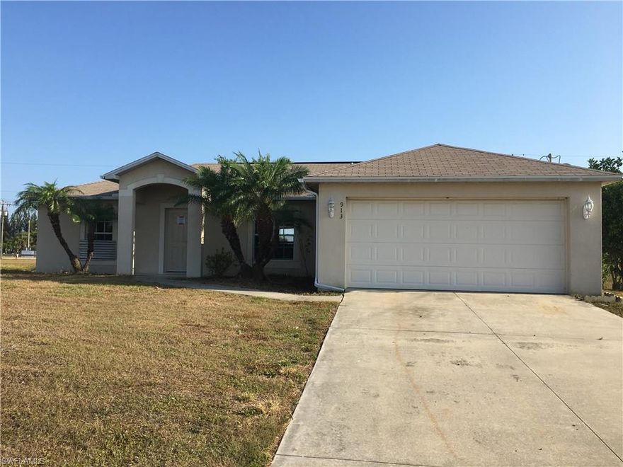 THIS IS AN AUCTION PROPERTY.  open floor plan, city utilities are in the neighborhood and this property needs to be connected to the City Services.  Suggest buyer speak to the City of Cape Coral Code Compliance and New Construction departments in order to see what is required in order to close.  Seller will require a holds harmless agreement.  Needs work, but it's an excellent area!