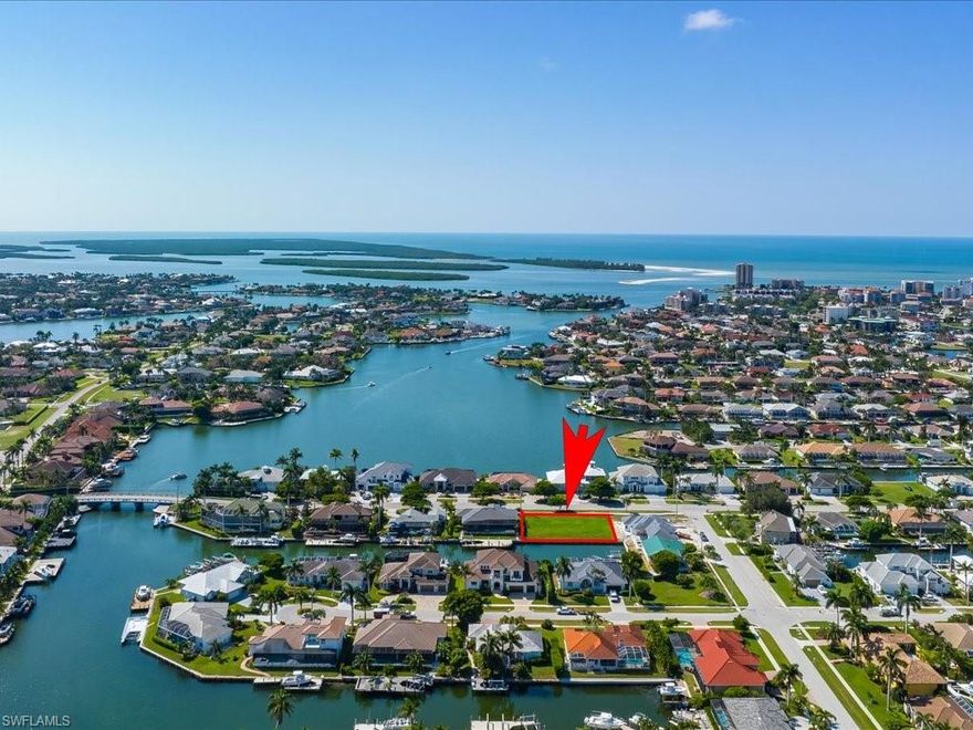 Oversize lot for future home build a few blocks from beach and great restaurants.   120 ft of seawall - 20 to 50% larger than most Marco waterfront lots. Super desirable location, a quick short distance to open Gulf waters - 8 minutes at idle speed.