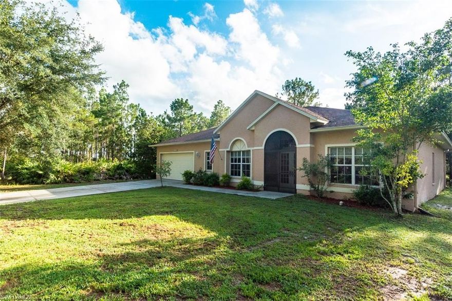 Located at the end of the street on 1.14 acre, high and dry lot. Minutes from the new Publix, charter school and future community park. Immediately when you enter this home you will feel the comfort of the large open floor plan. With over 2,200 square feet under air, this 3 bedroom + Den home features gorgeous real wood floors, 9ft high ceilings, large master suite with sitting area, spacious laundry room, eat in kitchen with granite counter tops and island. Enjoy the privacy of this spacious lot from your screened lanai. Home is fitted with a generator panel. 

Call today to take a tour of this home!