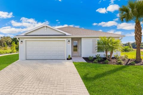Photo of 727 NEWHALL ST E, LEHIGH ACRES, FL 33971 (MLS # 226016932)