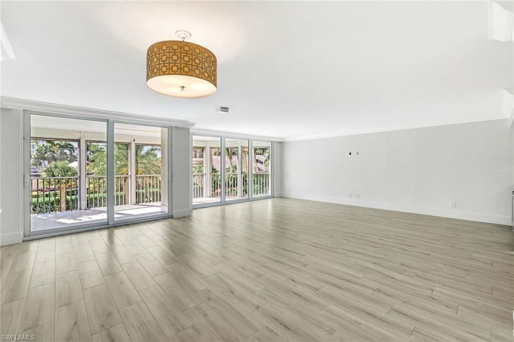 Photo of 4401 Gulf Shore BLVD N #C205, NAPLES, FL 34103 (MLS # 225081759)