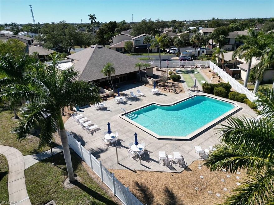 Move in ready Furnished corner unit with beautiful upgraded Granite kitchen featuring built in cabinet unit 2024.  Split bedroom floor plan with Crown Molding throughout.  Large Master as well as gorgeous upgraded tile bath.  Desirable location makes the feel very private.  Enclosed screened in patio 2024 with Bar area as well as a summer kitchen featuring gas grill and Blackstone grill.  Roofs replaced in 2024.  Newer water heater.  LOW HOA fees.  NOT in Flood Zone.  Call today easy to show and in central location close to everything.