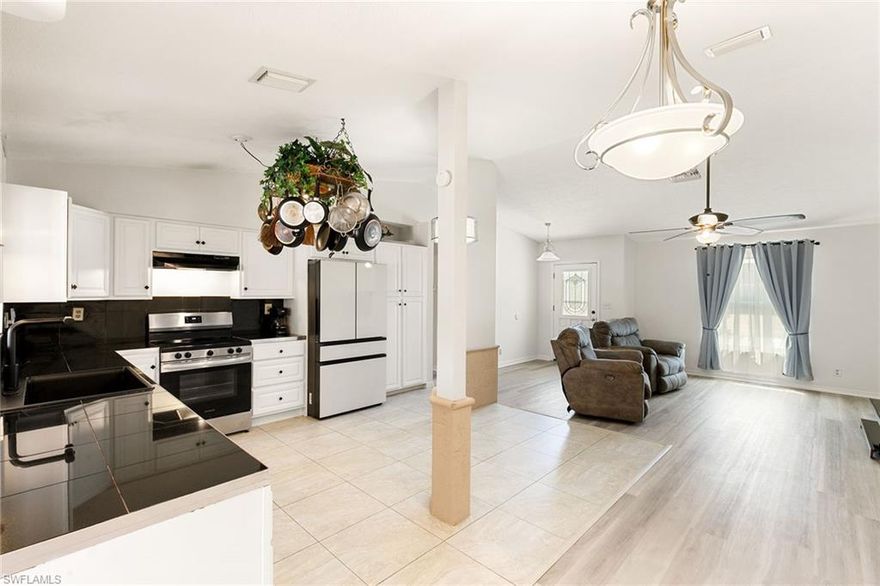 Just a short distance from dining, shopping and beautiful Riverside Park in the heart of downtown Bonita Springs, this charming three-bedroom, two-bath home offers convenience and flexibility in a desirable location. Inside, the home provides comfortable living spaces with plenty of storage throughout, making everyday living easy and organized. The layout offers a welcoming atmosphere with room to relax, entertain or work from home. One of the standout features of the property is the additional flex space that can be used as a workshop or retreat. This area includes removable air conditioning and can easily be converted back into a single-car garage if desired, giving future owners multiple options depending on their needs. Go outside and enjoy the peaceful backyard sanctuary. The spacious outdoor area offers plenty of room for gardening, relaxing or creating your backyard oasis. For those interested in a more sustainable lifestyle, the yard even provides the opportunity to keep your hens while enjoying the privacy and charm of the space. Additional highlights include a roof replaced in 2018 and the home being in an X flood zone, offering added peace of mind. Whether you're looking for a primary residence, seasonal getaway or investment opportunity, this home combines location, flexibility and outdoor living in one appealing package. With downtown Bonita Springs nearby and easy access to parks, dining and local attractions, you can enjoy the best of the Southwest Florida lifestyle right from your doorstep.