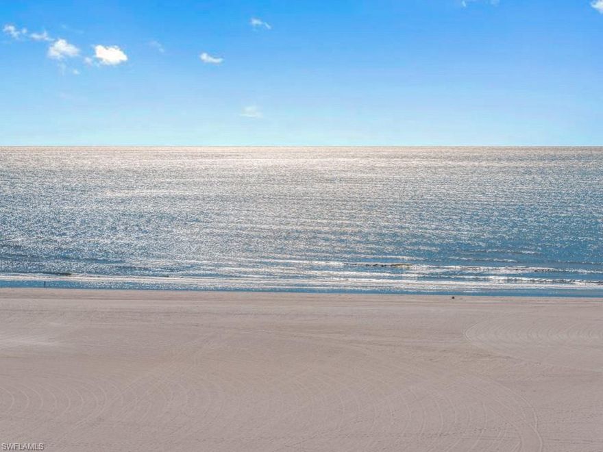 Stunning, penthouse floor residence was just completely updated (November 2025) and boasts raised ceilings and expansive 32' triple balcony with sweeping views of Marco Island's pristine white sand beach.  This fully renovated 2 bedroom, 2 bath home offers ample natural light and luxurious finishes throughout including premium wood-look vinyl flooring, crown molding, recessed lighting, and much more. Enjoy an open floor plan design that accentuates the picturesque views and raised ceiling heights in the living room and both bedrooms offering rarely available 9.5’ ceilings. The kitchen is complete with gorgeous quartz counters, stainless appliances, white cabinetry, elegant herringbone backsplash tile, and extended island creating a large breakfast bar – perfect for entertaining. The master suite is a private retreat offering beautiful views, walk-in closet, and spa-like ensuite bath with elegant counters, white cabinetry, and walk-in shower with glass door. Guests will appreciate the second bedroom with access to the terrace and second bath. With expansive views of the crescent-shaped beach, the spacious terrace is the perfect place to relax and unwind while enjoying the gentle island breeze, fresh salt air, and the sound of the waves gently rolling in. Enjoy extra peace of mind with impact rated sliding doors. Additional storage locker and common laundry facilities on every floor. Tradewinds offers lush, tropical landscaping, a secured lobby with on-site manager, social room with kitchen, grill area, gorgeous pool, vehicle wash, and private beach access. Tradewinds is centrally located near a wide array of shopping and restaurants. Do not hesitate to make this top floor, beachfront residence your island oasis. Seller is a licensed real estate agent.