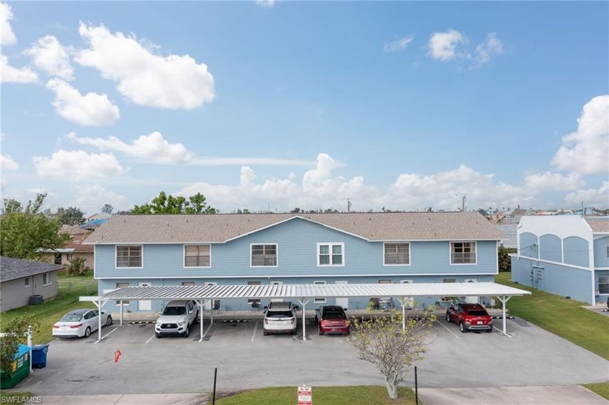 Welcome home to this beautifully appointed end unit townhouse. Its light and bright coastal style is perfect for permanent or seasonal residents looking to enjoy the laid back Florida lifestyle. This spacious 2bed 1.5bath townhome has been updated throughout including granite countertops, stainless steel Samsung appliances, and gorgeous vinyl plank flooring. It features covered parking, community pool, and clubhouse. The HOA allows pets and your monthly fees include building & flood insurance, lawn land maintenance & pest control, plus water and trash removal. Fantastic location only minutes to shopping and dining in downtown Cape Coral. This move-in ready updated townhome is waiting for its new owner.