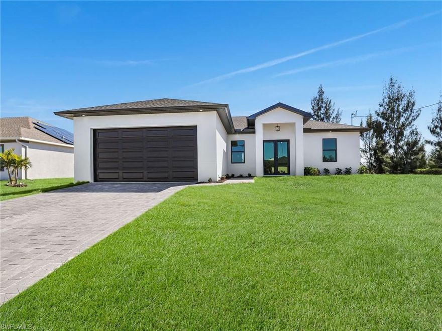 Brand New Construction – Move-In Ready Rental in Cape Coral! Discover this stunning 3-bedroom + den, 2-bathroom home, now available for rent in one of Cape Coral’s most desirable neighborhoods! Enjoy breathtaking freshwater views from this beautifully designed, modern home. Featuring a gourmet kitchen with a sleek waterfall quartz island and high-end stainless steel appliances, this home offers both style and functionality. The spacious laundry room includes a dedicated folding area and ample cabinetry for effortless organization. Built with impact-resistant doors and windows, this home not only enhances safety but also helps lower your electric bill by improving energy efficiency. With soaring high ceilings, the open layout creates a bright and airy atmosphere. Don’t miss this incredible opportunity to rent a brand-new, move-in-ready home!