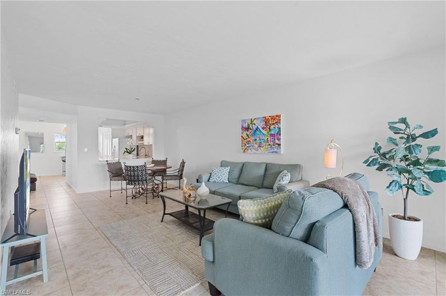 Renovated top to bottom in 2020, this 2 bed, 2 bath condo in The Fountains (55+) feels fresh, comfortable, and completely move-in ready. Inside, you’ll find updated tile and LVP flooring, quartz countertops, cabinetry with brass hardware, a striking stone hex backsplash, and two fully renovated bathrooms. A fresh coat of paint was just added throughout, giving the space a clean, cohesive feel. All windows and doors are impact grade, and the lanai is equipped with pull-down storm shutters — offering full protection and peace of mind during hurricane season. The southwest-facing lanai brings in plenty of natural light from mid-afternoon through sunset, with a lake view that immediately draws your attention as soon as you step into the kitchen and living room. The way the sunlight reflects off the water gives the space a calm, inviting energy that’s hard to beat. This unit is just steps from the community pool and grille area — ideal for easy socializing or a quick dip — and your deeded carport is conveniently located nearby. The Fountains is a well-maintained, active 55+ community with low HOA fees and a laid-back, friendly feel. You're about 15 minutes from Olde Naples, with quick access to luxury shops, great dining, and local favorites like the Naples Pier and Lowdermilk Beach. Golfers will appreciate having public courses like Lely’s Mustang and Flamingo, as well as Hibiscus Golf Club, just around the corner. Whether you’re looking for a seasonal escape or a full-time home, this one makes it easy.