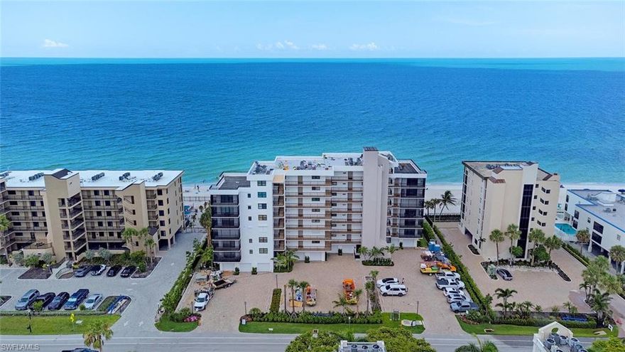 Renovated 4th floor beachfront condo offering spectacular sunset views of the beach and Gulf at Seawatch of Vanderbilt Beach.  This turn-key furnished unit features a wide-open floor plan with a spacious living area, two bedrooms, two full en-suite bathrooms and an open den that could easily be enclosed if desired.  Highlights include new wide plank wood-look luxury vinyl floor throughout, an open kitchen with a large peninsula, numerous windows and sliders that surround the space to soak in the stunning views and a wide lanai perfect for watching sunsets and enjoying the coastal breezes.  The primary suite features a large walk-in-closet and a modern en-suite bathroom with a dual vanity and a glass enclosed shower.  The interior of the unit has been well maintained, was just recently repainted and has a full-size washer dryer in the unit.  Seawatch is an intimate beachfront building with 26 units offering direct beach access, an expansive grassy lawn, a sparkling pool and sundeck, newly renovated lobby and a brand-new community room.  The building also has a new roof, new lanais, the exterior has been freshly painted plus a new fence and new lighting are coming soon.  Seawatch owners are permitted to have one small pet and is investor friendly as owners can lease the unit 12 times a year with a minimum of 30 days for each lease.  Incredible beachfront location is within short walking distance to multiple beachfront dining options; The Turtle Club, The Ritz-Carlton Beach Resort and LaPlaya Beach Resort.  Public tennis and pickleball courts are coming soon nearby at the Pelican Bay Community Park.  Don’t miss this opportunity to enjoy life on the beach in Naples!