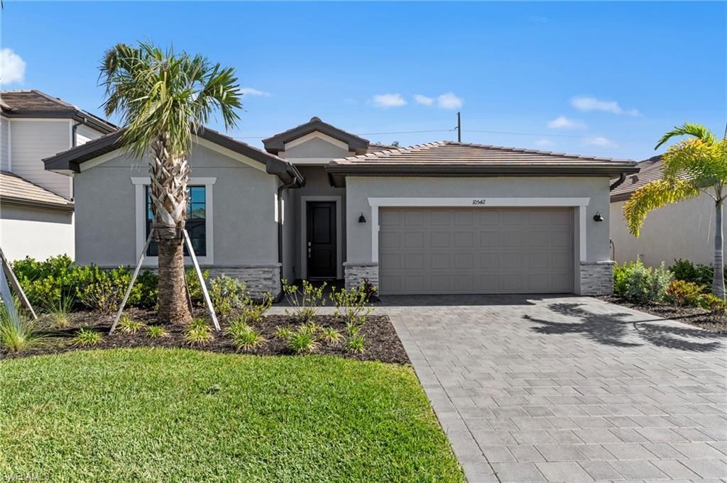 Photo of 10542 Timber Creek DR, FORT MYERS, FL 33913 (MLS # 226016279)