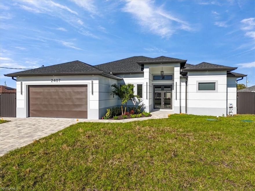 Seller contributing $10,000 towards buyers closing costs! 
Newly built modern home in Lehigh Acres offering 1,845 sq ft under air and 2,595 sq ft total. This 3-bedroom plus den, 3-bath residence features 10-ft ceilings, an open-concept layout, and high-end finishes throughout. Interior highlights include white porcelain tile flooring, a custom accent wall, modern lighting and ceiling fans. The kitchen is designed with sleek cabinetry, quartz countertops, and stainless-steel appliances including washer and dryer. The primary suite offers a spa-inspired bathroom with freestanding soaking tub, floor-to-ceiling tile, illuminated mirrors, quartz countertops, and spacious his-and-hers built-in closets. Secondary bedrooms also feature built-in closets, with all bathrooms finished in modern vanities and full-height tile.
Enjoy indoor-outdoor living with a covered lanai featuring exterior tile flooring, outdoor kitchen cabinets, sink, quartz countertops, and a dedicated pool bath with shower. This home is also equipped with impact windows and doors, full water treatment system, recessed soffit lighting, paver driveway with wraparound pavers, perimeter metal fence, and a 400-sq-ft epoxy-finished oversized garage!
Don't miss out on this amazing home!