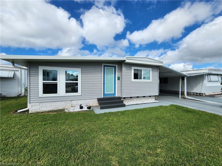 Charming & Convenient Naples Getaway! Welcome to Enchanting Acres Mobile Home Park, a vibrant 55+ cooperative community perfectly situated in the heart of Naples, Florida! This spacious double-wide home combines comfort, convenience, and an unbeatable location just minutes from the beach and downtown.
Enjoy peace of mind with impact-resistant windows, durable vinyl siding, and efficient mini-split A/C systems to keep you cool year-round. Step outside to your covered carport and back patio, perfect for relaxing.
As a resident of Enchanting Acres, you’ll love the active Florida lifestyle — take a dip in the community pool, join friends for shuffleboard, or meet neighbors in the clubhouse featuring a resident kitchen, billiards room, and library.  Water, sewer, trash, lawn care, and use of all amenities are included in the low monthly co-op fees, making maintenance a breeze!  Whether you’re seeking a seasonal escape, a full-time Florida retreat, or a second home, this property checks every box.