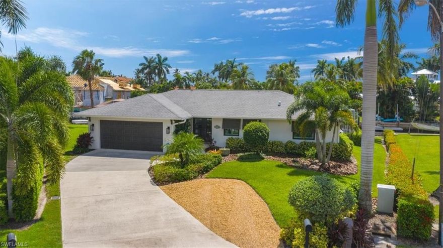 Super cute and newly renovated Royal Harbor home is now available! Located on one of the best locations available in the Royal Harbor neighborhood, 1560 Bluefin Court is located on a quiet cul-de-sac. This oversized, pie shaped, Southern facing lot has over 150 feet of waterfront with southwest exposure! The positioning of the home ensures maximum light and sunshine in your backyard and outdoor living space! Boaters will appreciate the direct access to the gulf of Mexico and beyond with ample space to add lifts etc. A boater's dream! Completely renovated, with new a/c ducts, complete interior redo with new impact windows throughout. This open floor plan home features a large kitchen island, quartz countertops in kitchen and baths with new cabinets throughout! Fantastic finishes, with attention to the small details!  This fabulous Royal Harbor property is available now!