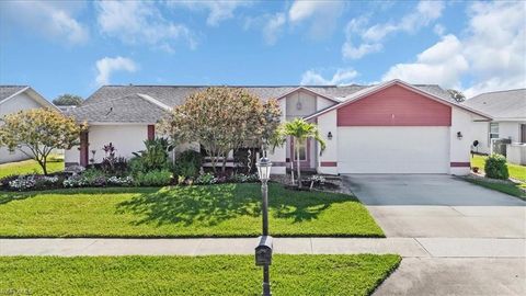 Photo of 10620 Regent CIR, NAPLES, FL 34109 (MLS # 225043264)