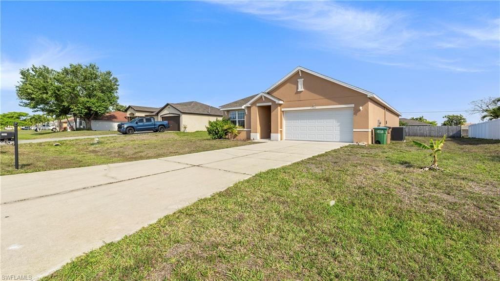 Photo of 1111 SW 41st TER, CAPE CORAL, FL 33914 (MLS # 226013497)