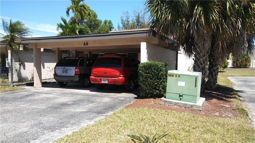 This is a great 2 bedroom /2 bath end unit with den and backyard., granite counters, backsplash, granite flooring in main living areas (entry, kitchen, baths & liv rm). Bedroom suites have wood flooring. Den can be 3rd bedroom. 
BBQ grill  & outdoor furniture including table & chairs on full screened lanai & wicker chairs & end table on front porch convey at no cash value. 2 carport & 2 uncovered parking spaces attached. This home is conveniently located near 41 & DanielsPkwy/Cypress Lake Dr within walking distance of many restaurants, shops, movies (Bell Tower), grocery stores & car rental as well as on bus route. 10 miles to beaches or airport. 
****Realtors see REMARKS.**** Show and sell today!The following items are  recent upgrades and improvements:
NEW HURRICANE WINDOW/DOORS (2013)
NEW ROOF (2014)
NEW STAINLESS STEEL APPLIANCES (2015),
NEW A/C (2016),