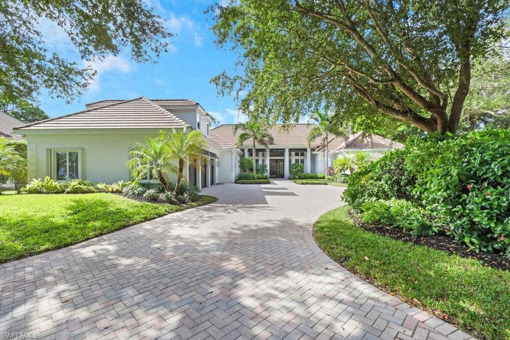 Photo of 678 Katemore LN, NAPLES, FL 34108 (MLS # 225079039)