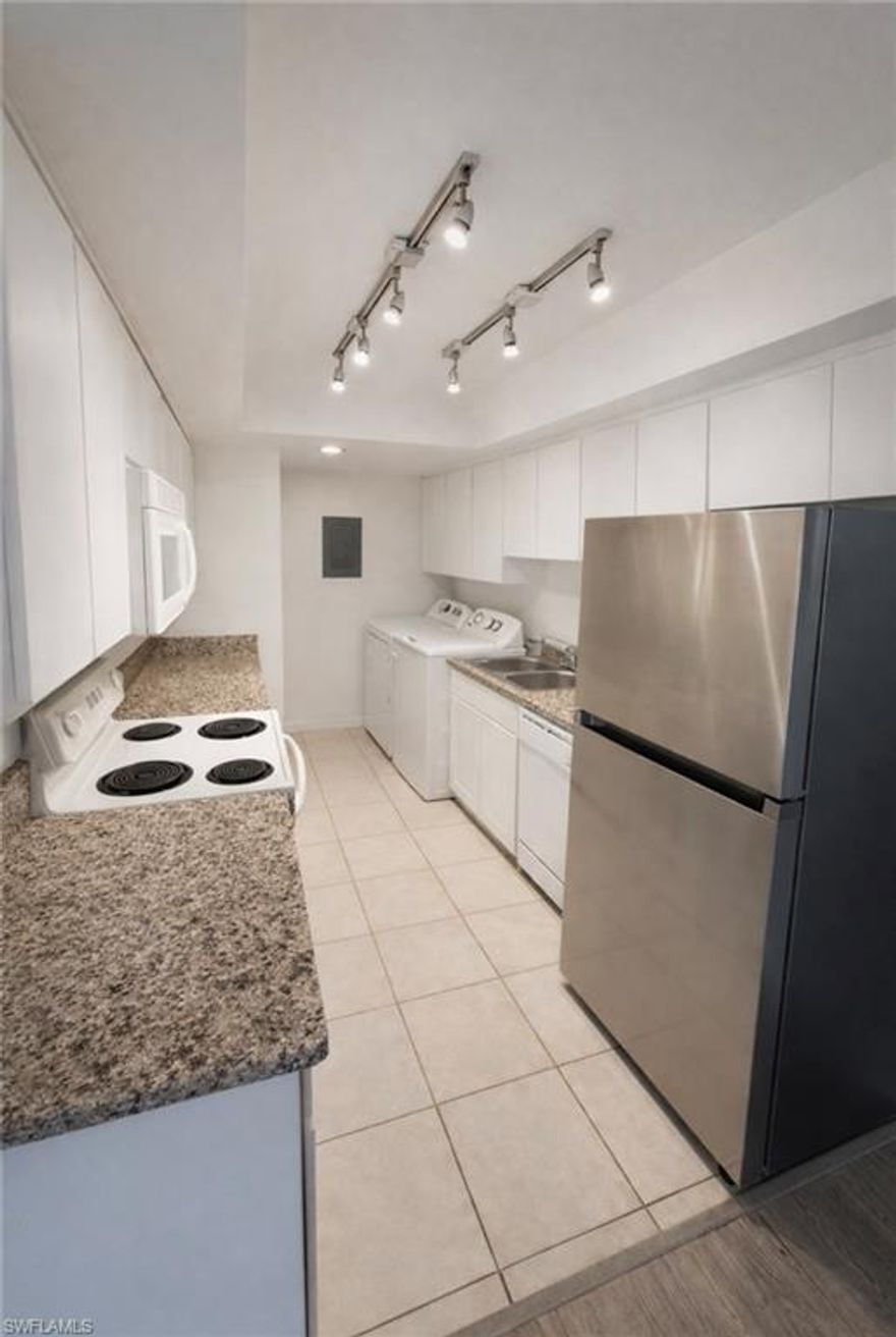 Nestled on the second floor (elevator available), this quiet corner unit provides a picturesque view that will leave you in awe. The pet-friendly community ensures that your furry companions can also enjoy the beauty of this remarkable location. Whether you are looking for a permanent residence, a seasonal getaway, or an investment opportunity, this place checks all the boxes. The upgrades includes an A/C, Water Heater, and Luxury Vinyl Plank Flooring installed 2021, a sleek Stainless Steel Refrigerator with Ice Maker, a convenient Garbage Disposal, and a Washer/Dryer inside unit. The kitchen is adorned with stunning granite countertop as well. Also features a glass-enclosed lanai givnig it a nice touch. Ample closet space in the bedrooms and an additional storage locker just steps from your front door, you will have no shortage of space to keep your belongings organized. Water/sewer & cable are included in the Association dues, making your life hassle-free. Assigned carport parking and ample guest parking ensure that you and your visitors will never have to worry about finding a spot. And when you're in the mood for relaxation, the pool and spa are just a short walk away, offering a serene retreat. To top it all off, the Lakewood Country Club offers an optional membership that grants you access to an 18-hole golf course, as well as amenities like Pickle-ball, pool, and tennis courts. And if you ever crave the vibrant energy of downtown Naples, shopping, or the soothing embrace of the beach, rest assured that they are all within a short distance. In conclusion, living on Lakewood Golf Course is not just about finding a home-it's about embracing a lifestyle that combines elegance, tranquility, and convenience. Don't miss out on this opportunity to experience the art of writing your own story in this remarkable community.