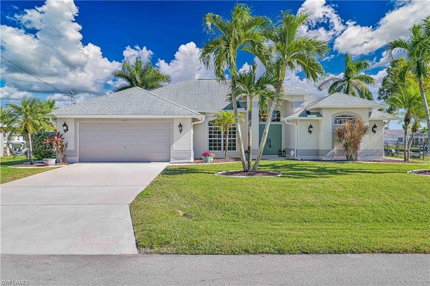 DIRECT Gulf access with no bridges from this beautifully maintained SE Cape Coral waterfront home on a private corner lot. Offering 3 bedrooms + a home office/den, 2 baths, this split floor plan features tile flooring, vaulted ceilings, and updates throughout. Enjoy true Florida living on the screened lanai with a heated saltwater pool - perfect for year-round entertaining. Storm-ready with electric/manual shutters, a fenced yard, and city water & sewer with assessments paid. Boaters will love the quick, easy access and canopied wrap-around dock/lift setup with electric and water available at the dock. Schedule your private showing today!