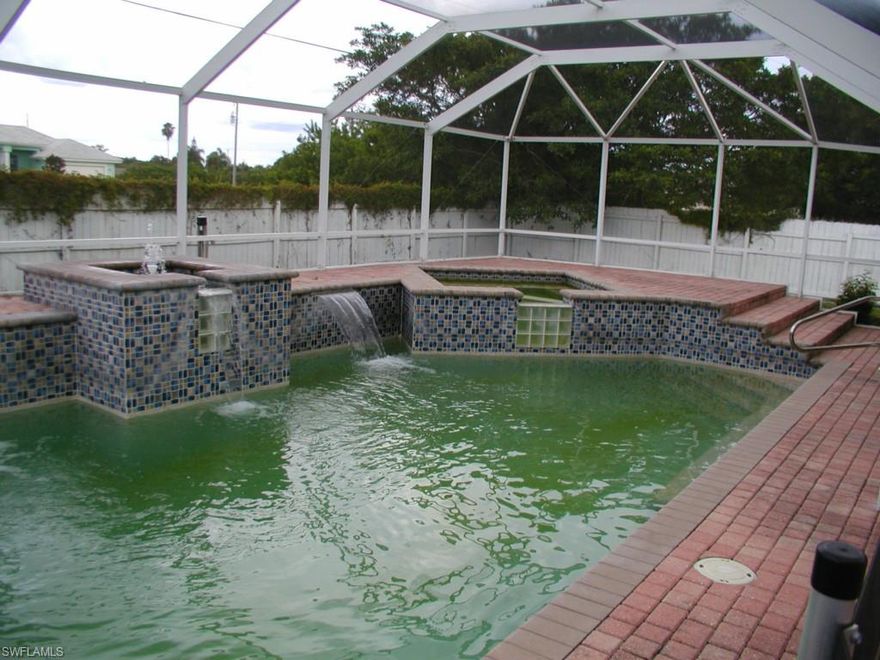 This is a great move in ready pool home. The pool area is over the top! The pool and spa is heated with two waterfalls and a overflow from spa. The pool area is the entire length of the home with beautiful pavers tiered around the entire area. The home has an open kitchen with tile floors in the kitchen, bathrooms, laundry room and master bedroom.