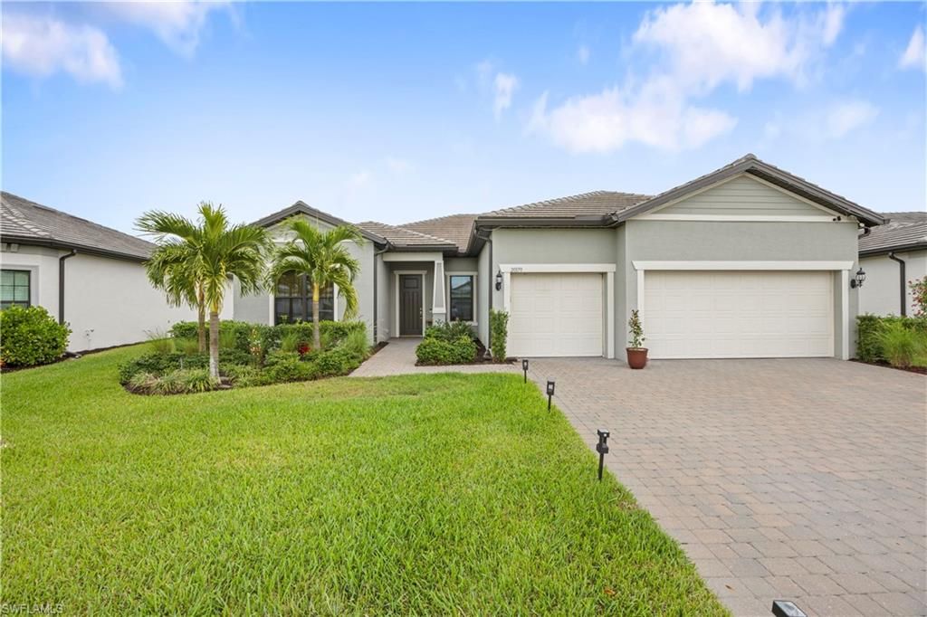 Photo of 20179 Millrun DR, ESTERO, FL 33928 (MLS # 225082732)