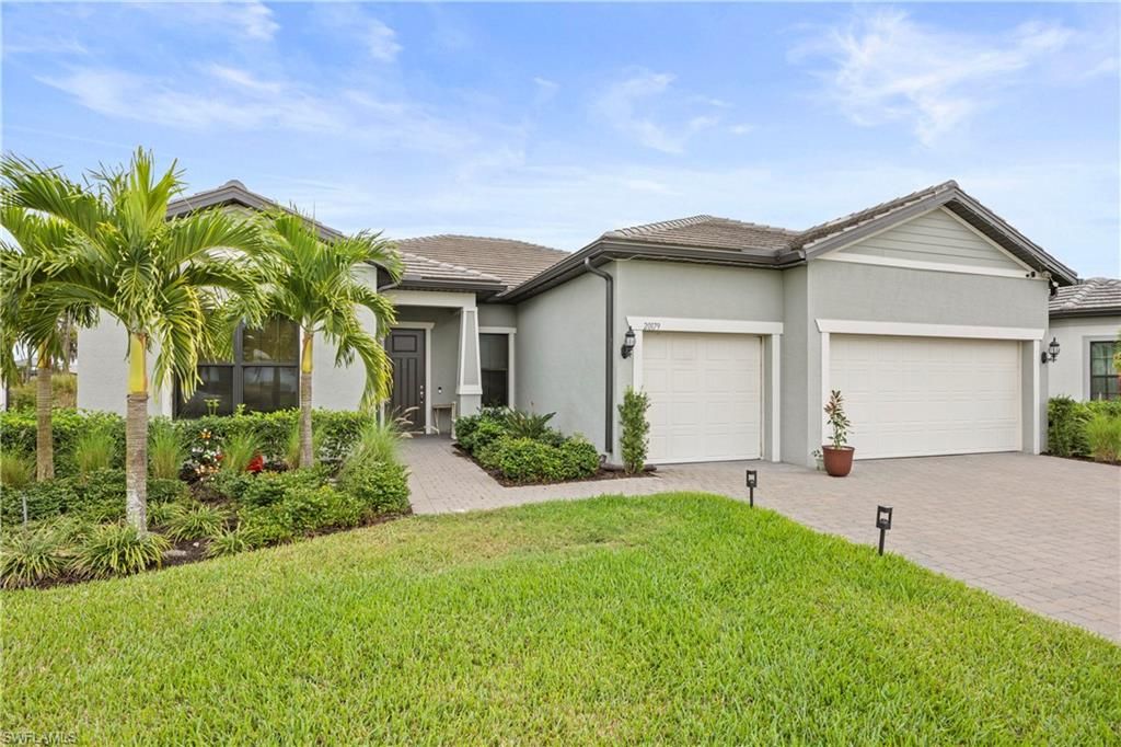 Photo of 20179 Millrun DR, ESTERO, FL 33928 (MLS # 225082732)