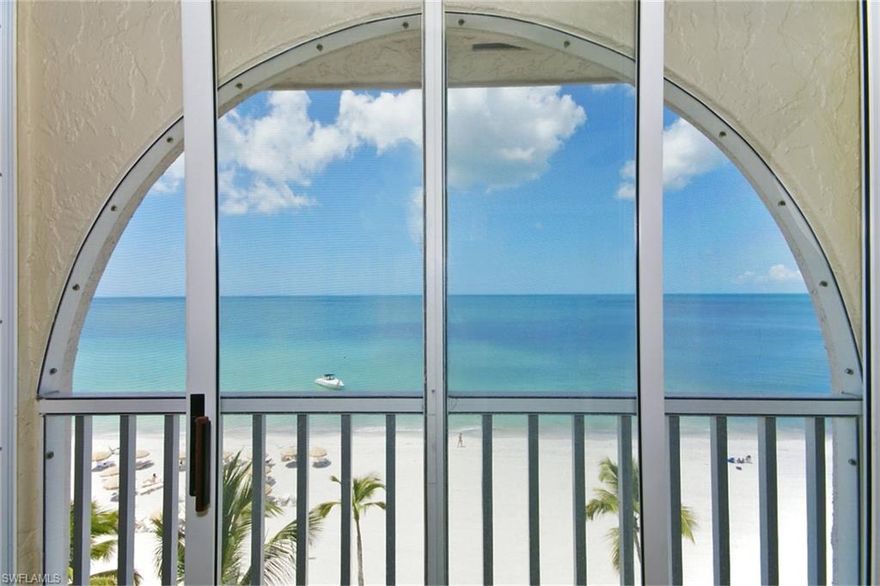 SUNSETS FOR LIFE.....Sensational views from your spacious lanai, A rare 3 bedroom, 3 bath TOP FLOOR PENTHOUSE home.   Boutique Building with  Only 12 units, situated directly on the SAND.   Custom designed by Vogue interiors with exquisite finishes.  Custom Window coverings, Top of the line Stainless Steel appliances, granite counters, Electric fireplace and much more.  Private Garage, Deeded boat dock with Lift, Bayside heated pool, Large storage room,  walk to the Ritz Carlton, Turtle Club and La Playa and Enjoy use of the Dunes Beach Club located next door as courtesy members.   This property has it all.  Start enjoying the Naples lifestyle. Extra Bonus  (1)PET permitted with approval.