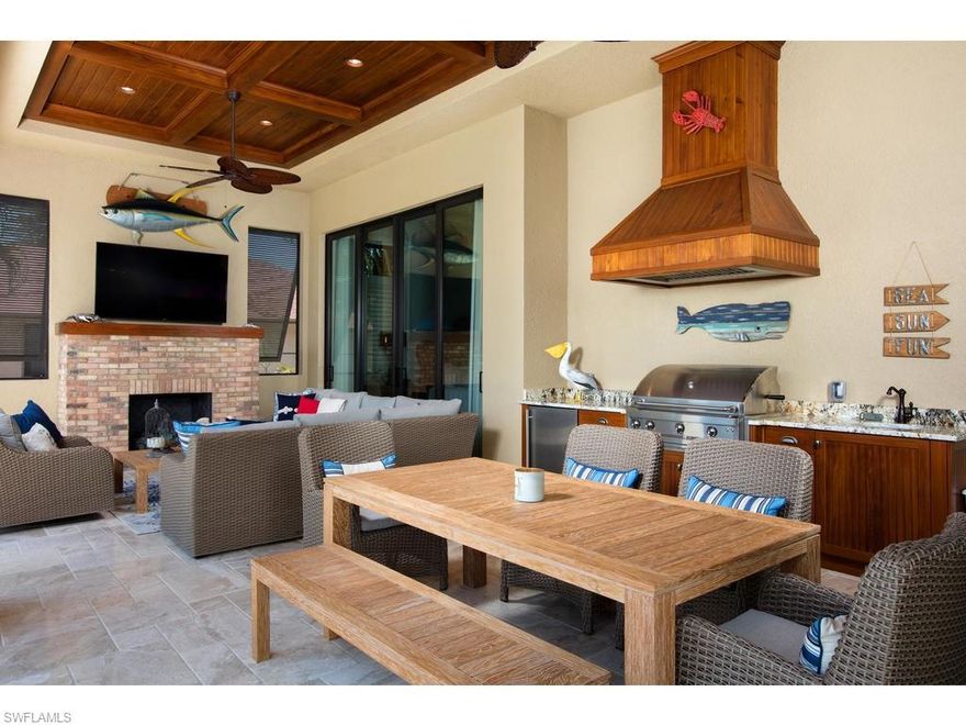 New Home without the wait!  Take advantage of this fantastic opportunity to own a spectacular home custom built for current owners by Marco Island top builder Aqua Custom Homes! Completed in 2017 NO detail has been overlooked from the reclaimed paver driveway to Solid Mahogany entry doors to the custom OVERSIZED  Euro pool design with sunken hot tub, water feature and fire water bowls * First floor with 13 ft ceilings impress from the minute you walk through the door! Open concept flows seamlessly from indoors to outdoor living! - impact doors open with a disappearing corner to the covered lanai with a cypress ceiling detail, gas fireplace and summer kitchen.. newly built Dock &  lift accommodates large boat as well as a jet ski lift..  Master suite with 2 large walk in closets.. PLUS! an additional bedroom suite on the first floor! You'll appreciate the fine finishes of this home and the thoughtful attention to detail including an abundance of storage! Fully storm protected including roll down screens and shutters! on both the first floor lanai and 2nd flr balcony All located in the highly desired Old Marco area where you are within a short stroll to lots of shops and restaurants.