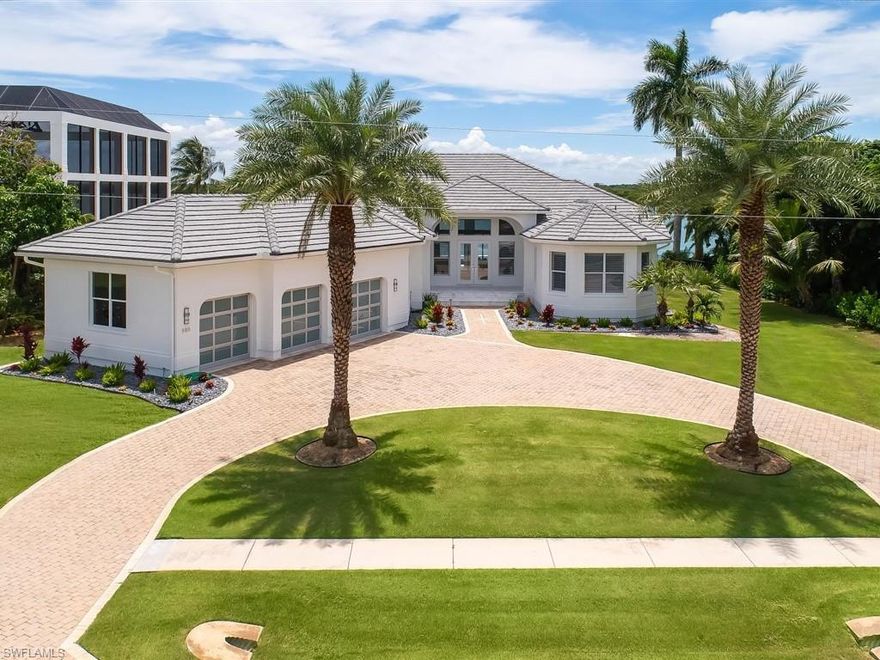 Absolutely magnificent direct access bayfront home with breathtaking Barfield Bay views that is located directly on Caxambas Bay! This Larry Taylor built Estates home has just finished a 2-year high-end renovation that boasts a new infinity pool & spa, stunning kitchen has high-end finishes including Wolf gas cooktop range & appliances including Sub-Zero fridge & white crystal marble countertops. This location has super wide & private views of the bay. Super fast out to the Gulf with no idle zones. Additional unique features include a shell stone beach next to Caxambas Bay, Mexican blue stone compliments the landscaping and an exquisite 2000+ Sq ft white Carrera marble lanai next to the huge pool & Spa. Located on Caxambas Drive this home is tucked in the most private location amongst the hills of the Estates. The 13' high ceilings allow for amazing views from almost every room in the house! The car enthusiast will absolutely love the garage that boasts new epoxy floors, high lift Impact glass garage doors and a new Bendpak Lift to allow more car storage, two additional lifts can be installed for 6 car total garage storage. This home has it all, Come make your dreams come true!