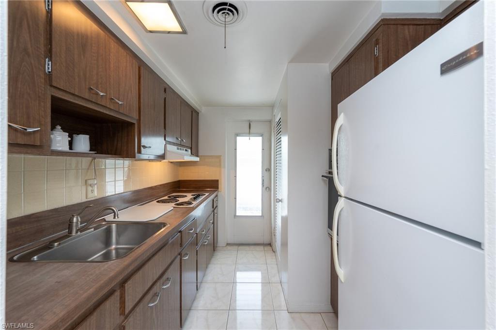 SANDCASTLE AT MOORINGS - Residential