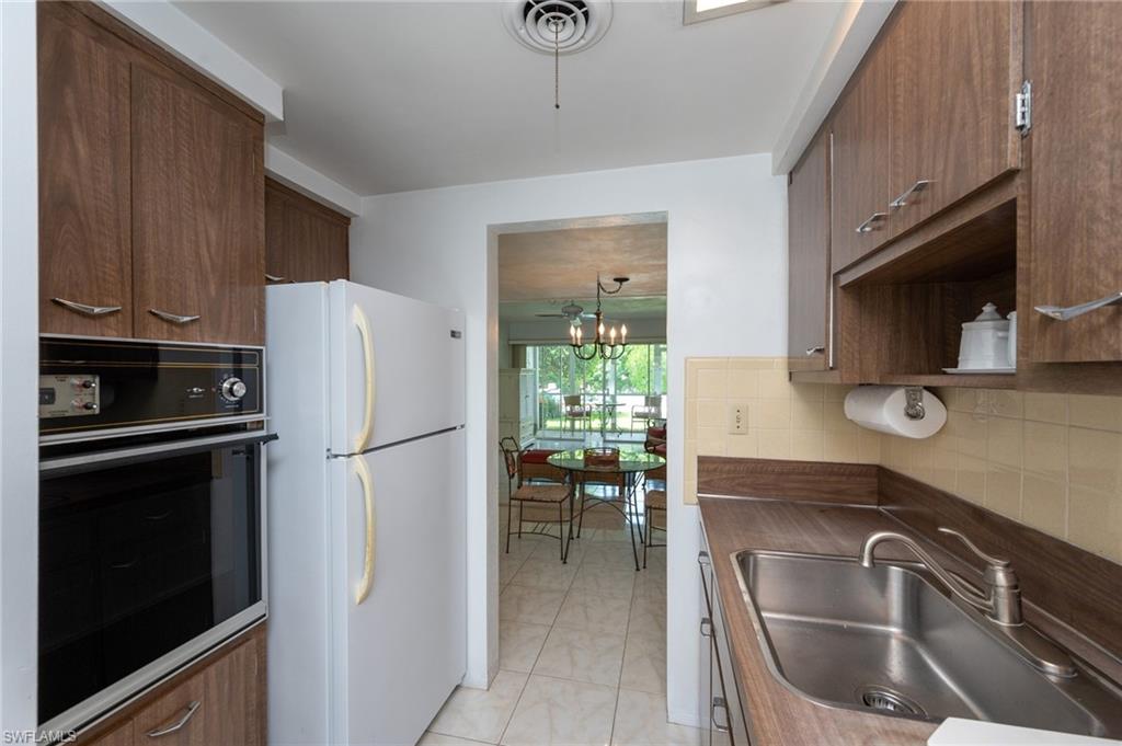 SANDCASTLE AT MOORINGS - Residential