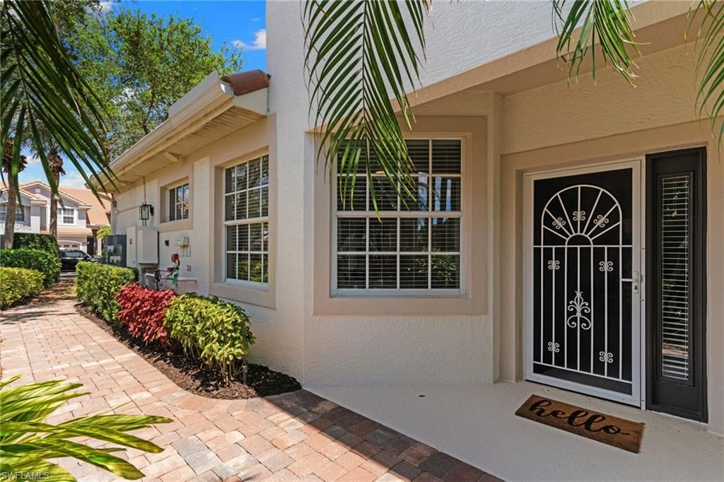 Photo of 1595 Winding Oaks WAY #103, NAPLES, FL 34109 (MLS # 226014181)