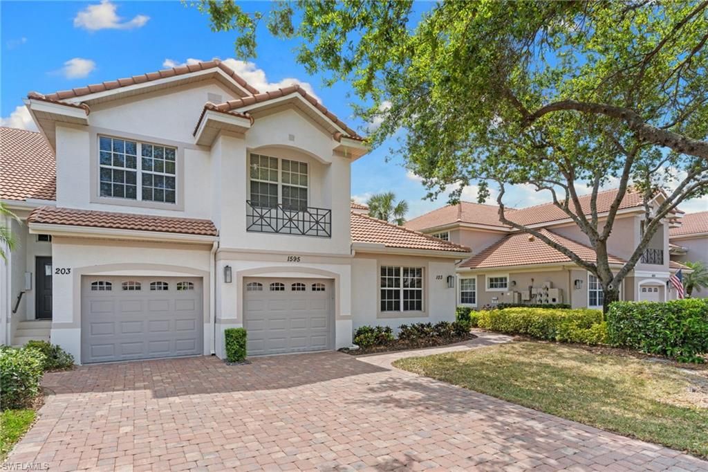 Photo of 1595 Winding Oaks WAY #103, NAPLES, FL 34109 (MLS # 226014181)