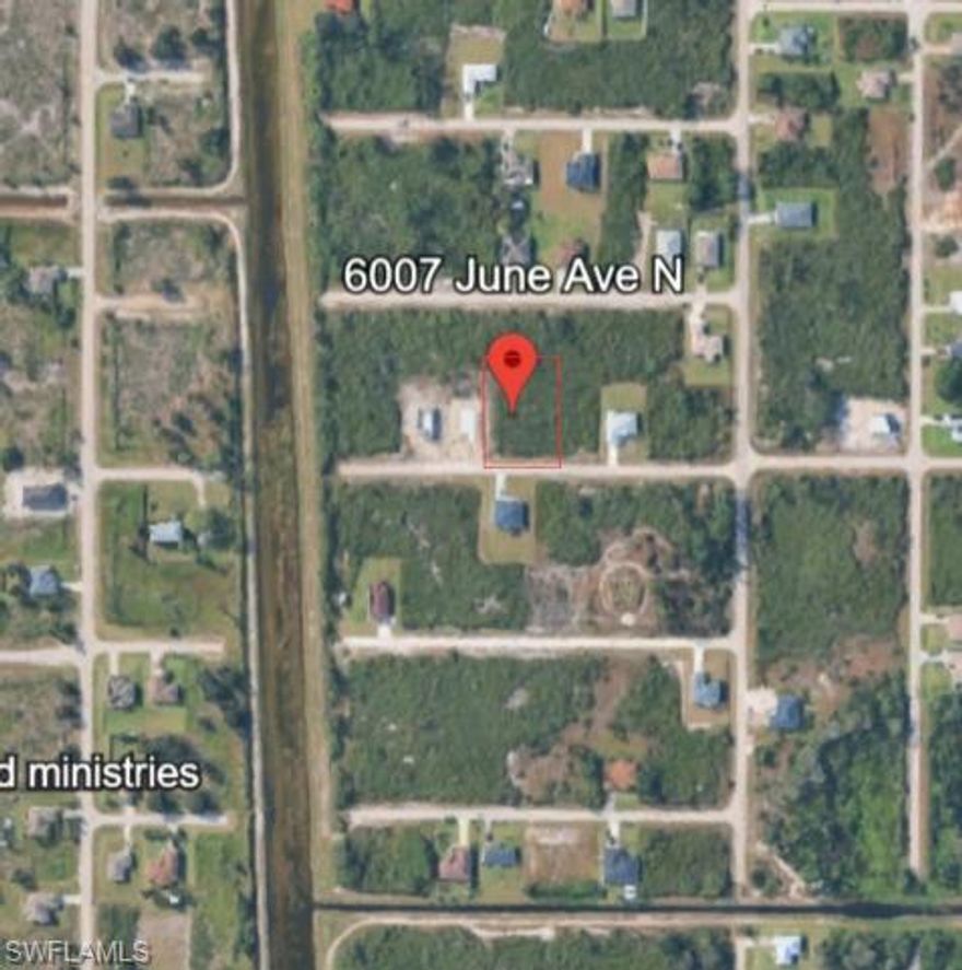 Vacant residential lot located in Lehigh Acres. Great opportunity for new construction or investment. Buyers to verify zoning, utilities, flood zone, and building requirements. Information deemed reliable but not guaranteed.