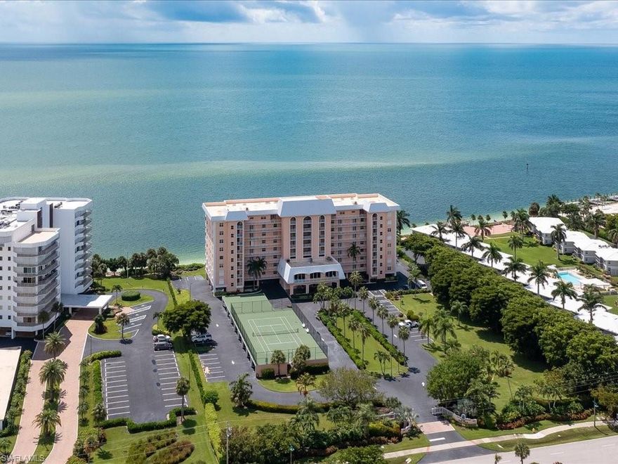 Mesmerizing, endless views of the Gulf of Mexico from this spacious 3 Bedroom, den, 3 bath Condo, nicely furnished turnkey.  Huge balcony with electric shutters, open floor plan, 2 parking spaces under building, and plenty of storage space.  Stainless appliances, quartz counter tops, Hunter Douglas Silhouette blinds, are a few of the upgrades.