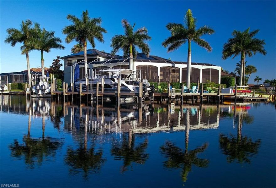 Remarks: Don't miss out on the opportunity to obtain your dream home here in Marco Island. Located less than half a mile from Residents Beach and just down the street from some of Marcos Islands top restaurants, this 4 bedroom, 4 and a half bathroom, plus a den house has everything you could ever need including a 4 car garage. This is a custom Divco home. There are many features included in this home that truly make it stand out from the rest. In the living space you will find volume tray ceilings as well as pocketing hurricane impact sliding glass doors and windows. The kitchen is equipped with wood cabinetry, granite countertops, and the perfect island for entertaining. On the lanai you can find a large heated pool and spa, as well as picture frame screens which provide a great view of the intersecting canals. There is a large composite dock built in with this home that includes a 27k lb extra wide boat lift, 16k lb lift and an additional floating dock.The home is equipped with solar panels and two Tesla powerwalls used as a secondary source of power. Every part of this home has been well thought out, in order to create an ideal space for any kind of family. Dont miss out on owning this piece of paradise!