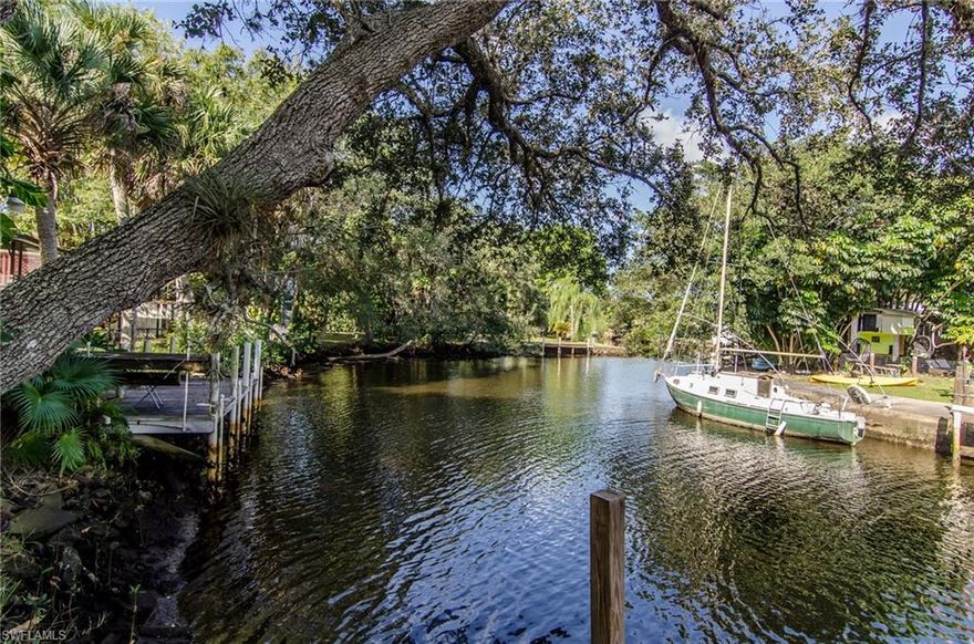 Waterfront Gulf access manufactured home LOT with gulf access.  Ability to build dock and boat ramp if needed. This lot is not part of any community or HOA. This is a Unique Rookery Bay area with only five homes on the street facing Henderson Creek.  Fisherman, Boaters and Kayakers must see this today!!! - Only 15-20 minute by boat to Keewaydin and minutes to Rookery Bay.