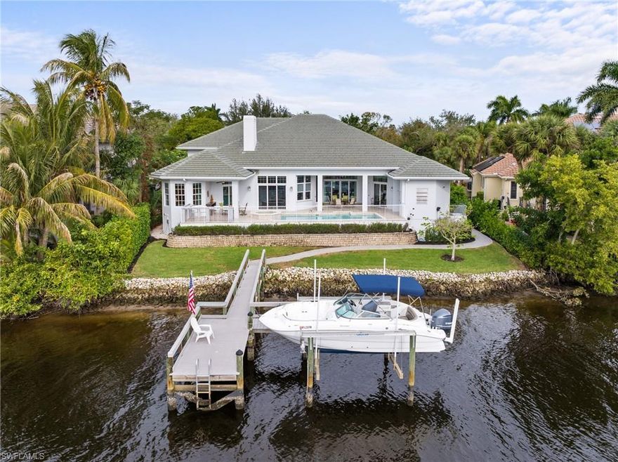 BONITA BAY, GULF ACCESS HOME ON THE IMPERIAL RIVER - BOATING & FISHING DELIGHT - GREAT OPPORTUNITY FOR A GULF ACCESS SINGLE FAMILY HOME IN BONITA BAY. This is a boater’s and fisherman's dream on the Imperial River in Hidden Harbor, one of Bonita Bay’s most beautiful and exclusive single-family luxury neighborhoods. Fish from the renovated dock equipped with a boat lift. Newly enhanced landscaping, lighting and irrigation create a floral paradise around the open pool deck and spa. Long river views offer breath-taking morning sunrises. This custom designed, one of a kind mansion on the river with Gulf access offers TWO primary suites on the first floor with gorgeous newly renovated luxury baths. The home is open and spacious with beautifully designed coffered and tray ceilings. It features an oversized laundry room with abundant storage throughout the home. Three separate HVAC zones. Made for entertaining family and friends, it features formal living and dining rooms for lavish parties as well as a newly renovated outdoor kitchen and bar area for BBQs under the sun or cocktail receptions under the stars. The TV room is newly renovated with gorgeous built-in cabinetry and room for a large screen TV. The home also features a newly installed full-home generator, a roof installed in 2017, newer AC in 2021, water heater in 2019, pool heater and pump in 2020, high-end light fixtures, newly installed ceiling fans, WaterCop leak sensors, impact sliders and windows along the rear of the home, Leaf Filter rain gutter system, three car garage, and a second floor suite with wet bar. Bonita Bay amenities include a private Beach Park on the Gulf of Mexico with lounges, umbrellas, grills, and more. Enjoy all nature has to offer with three onsite recreational parks - Estero Bay Park on the western edge (includes a Butterfly Garden), Riverwalk Park on the Imperial River, and Spring Creek Park at the northern border as well as a network of 12 miles of nature pathways for strolling or bike riding. The Bonita Bay Marina – located on the Imperial River – offers full service; 98 wet slips, dry storage for up to 326 vessels, launch, bait, fuel, ship's store, and onsite boat care. Backwater Jack's waterfront bar/restaurant is accessible by land or by the sea! Bonita Bay’s member-owned club offers memberships to five championship golf courses designed by legendary architects Arthur Hills and Tom Fazio, an 18-court tennis complex, two distinctive clubhouses, a Lifestyle Center featuring a 20,000 sq. ft. state-of-the-art fitness center, 9,000 sq. ft. spa and salon, pickleball courts and Sports Center, as well as world-class dining. Contact the Bonita Bay Club for membership information, pricing and availability.