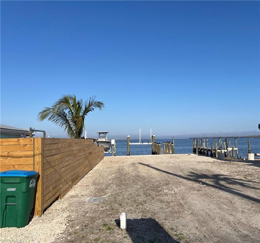 Discover the perfect blend of flexibility, beauty, and opportunity with this buildable waterfront lot in the heart of Matlacha! Whether you dream of building your custom coastal home or envision a commercial venture, this rare C-1 zoned property gives you the freedom to create your ideal waterfront lifestyle or business. Enjoy unobstructed sunrise and sunset views over the shimmering waters — a breathtaking backdrop to your everyday life. The property is cleared and ready to build, featuring a brand-new (2023) 10,000 lb. boat lift, composite dock, and seawall — all fully equipped with electric and water connections for instant boating and fishing enjoyment. From your private dock, explore Matlacha Pass and the Gulf of America with ease. This location is a boater’s dream, offering quick access to Pine Island Sound, Charlotte Harbor, Tarpon Pass, Redfish Pass, and beyond — some of the most renowned fishing waters in Florida. Nestled between Pine Island and Cape Coral, you’re minutes from local favorites — kayaking, biking, art galleries, shopping, and waterfront dining. Matlacha is known for its vibrant boating community and small-town coastal charm.