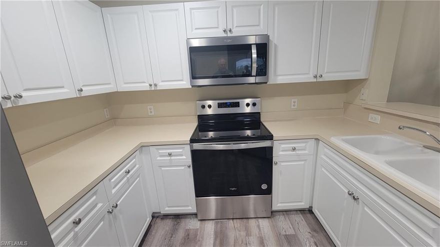 STEAL ALERT Top Floor Corner Condo.   Totally updated. Move right in.  Two King sized Bedrooms   Tiled Baths.  Newer Air and Hot water heater Steps to the pool and Gym Directly across the street.  Parks  EV  Charging  Pickle Ball Pet Park Play ground.  This is a great deal. New to the market.