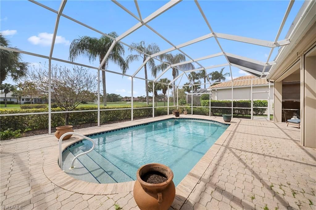 Photo of 8427 Gleneagle WAY, NAPLES, FL 34120 (MLS # 226007398)