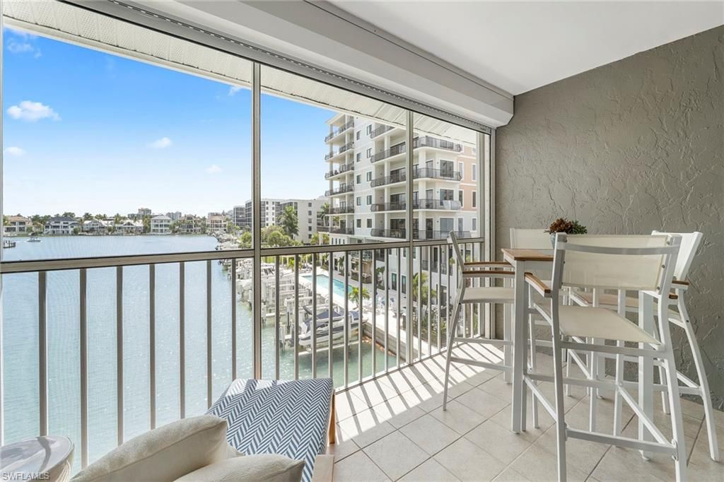 Photo of 10682 Gulf Shore DR #C305, NAPLES, FL 34108 (MLS # 226010521)