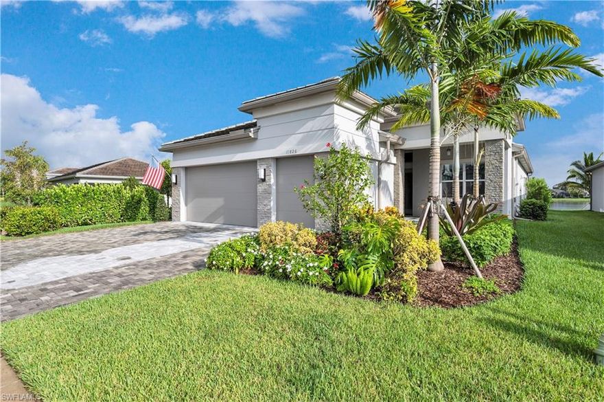 Welcome home to your exquisite Nautilus Pool home with spa in Valencia Trails.  11826 Drake Lane features 3 bedrooms + Den with 2.5 Baths and 2230 sq/ft under air.  Built in 2022, this home comes with all the bells and whistles. Kitchen comes well-appointed with upgraded pullouts and upper/lower under-cabinet lighting. Decorative transit window above kitchen sink was added as a unique feature to this property.  Bar area comes with sink, wine cooler, and under-cabinet lighting. Master bath features full mirrors and storage upgrades. Solid core doors, recessed lighting throughout, crown molding, upgraded fixtures, whole house water softener/purification system, and on demand hot water heater are some of the many additional benefits to this home. Southern exposure captures maximum sun and breathtaking sunsets. Relax in the tranquil lanai area featuring extra-long saltwater pool, elevated spa waterfall, expansive lake views, extended lanai, and picture screen pool cage. Outdoor kitchen fully equipped and ready to entertain with sink, fridge, gas grill, and TV hook up on the wall. The home also includes Impact Resistant Doors and Windows. Extra-large air-conditioned garage includes space for 2-cars and golf-cart. Conveniently located very close to the amenity center with numerous state of the art amenities including restaurant and bar, tennis, pickleball, bocce, community pool, lap pool, resistance pool, whirlpool-spa, cooking-studio, arts and crafts, dog-park, fitness center, nail salon, multi-purpose room, outdoor bar, sports-lounge, and social hall. 55 AND OVER NEIGHBORHOOD.